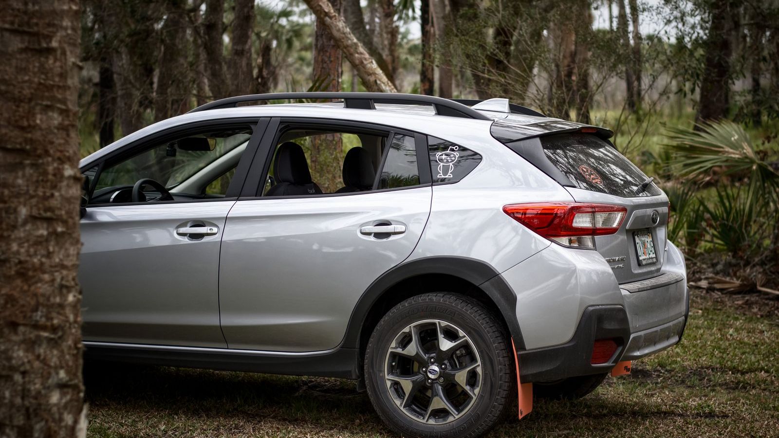 Silver mid-size SUV parked outdoors - Maruti Grand Vitara accessory guide 2026 by variant, what to add and dealer add-ons to refuse