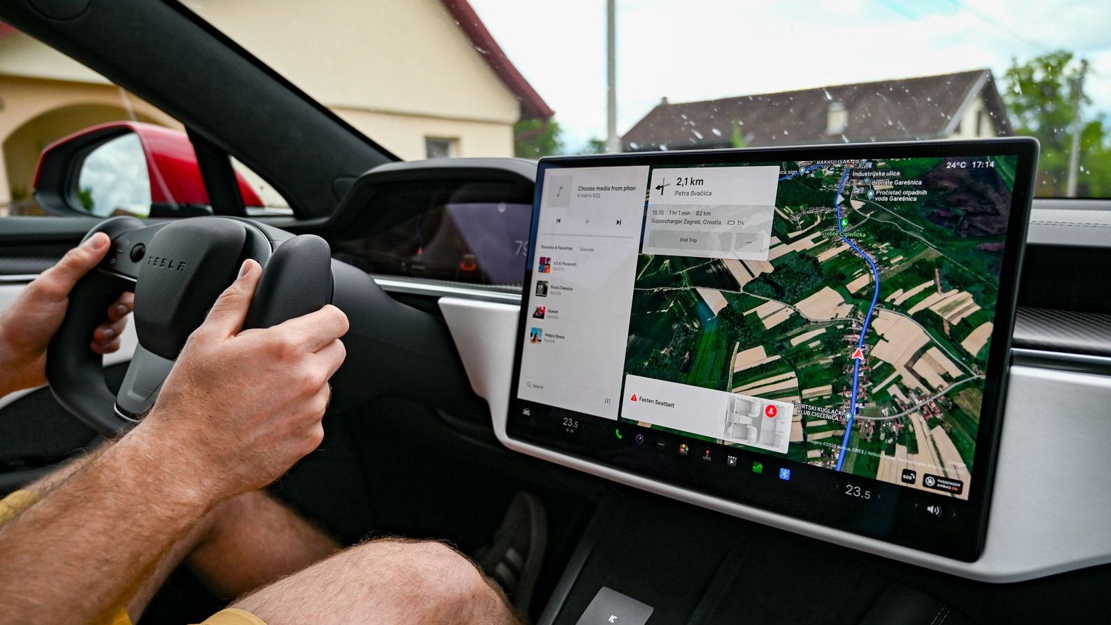 Car dashboard touchscreen running navigation and apps - CarPlay AI box guide India 2026, turning factory wired CarPlay into wireless with Netflix and Android apps, prerequisites and catches