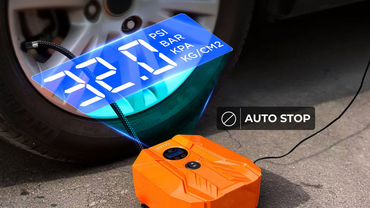 myTVS TI-16 digital tyre inflator connected to a car tyre valve, display set to 32.0 psi with auto stop