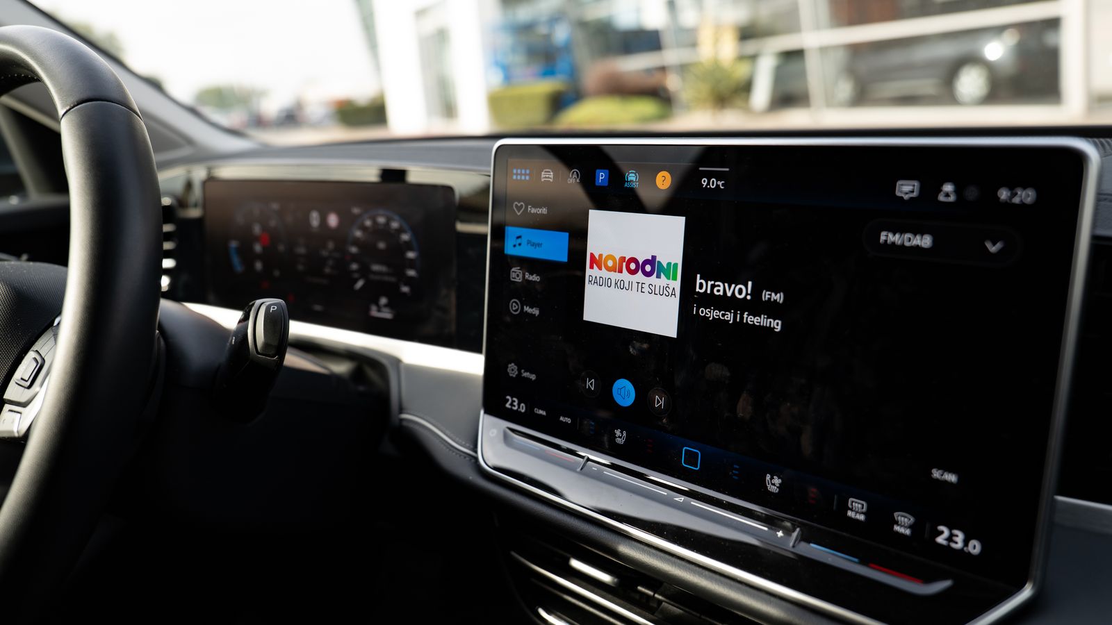 Car head unit screen size India 2026 - wide dashboard touchscreen showing small interface text with air vents below, pixel density and glare considerations for android players