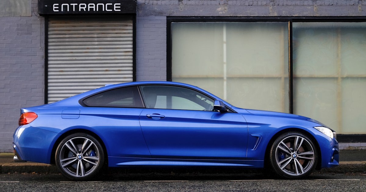 Car on an open highway road ready for a long drive with essential accessories installed