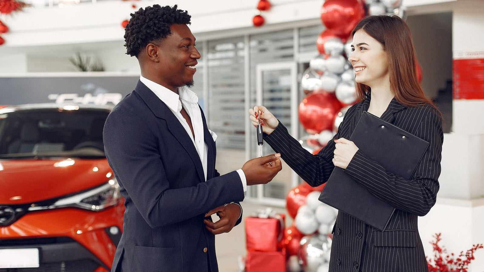 New car delivery day India 2026 - dealer handing over car keys at showroom, accessory bundle pitch decoded, 30-day cooldown rule