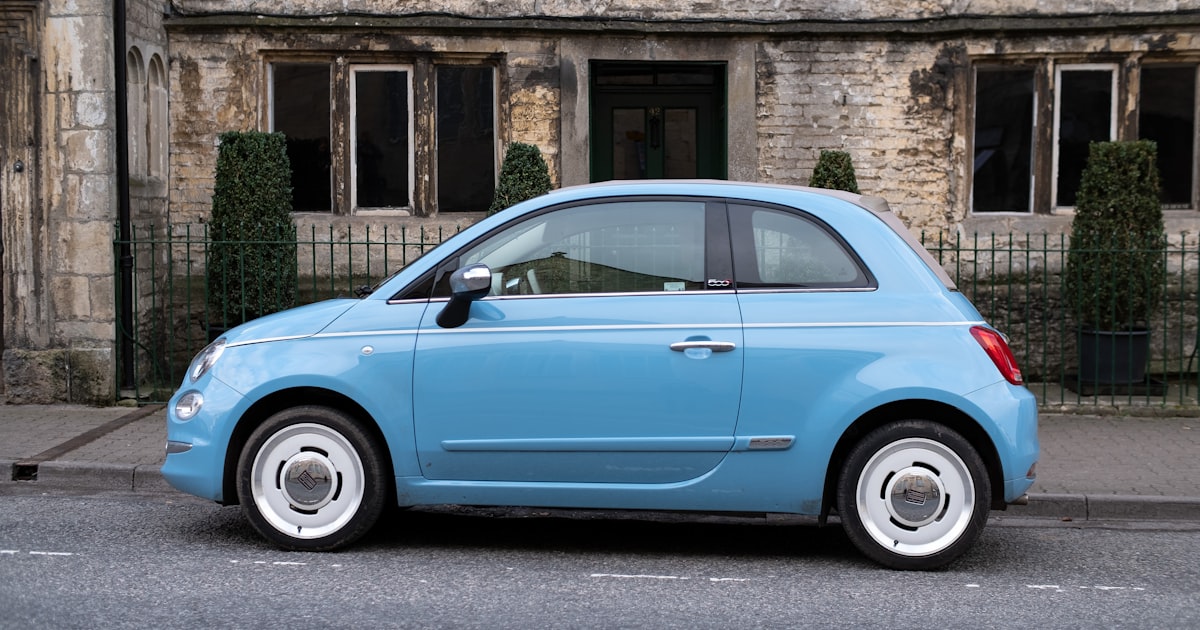 Car dashboard view while driving on road in India, dash cam perspective